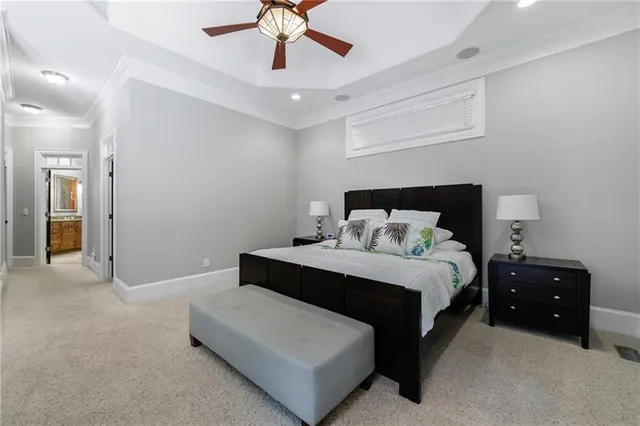a view of a livingroom with a furniture and a ceiling fan