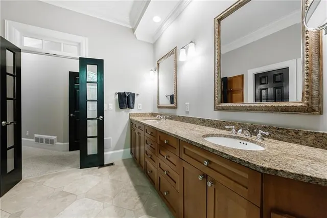 a view of a workspace with furniture and a bookshelf