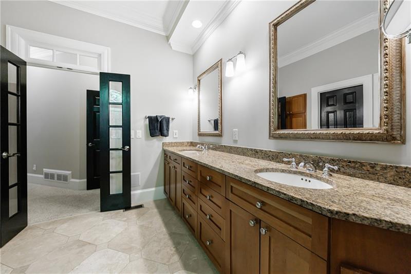 1255 Beech Haven Road Northeast Atlanta, GA 30324 - Photo 40 of 87 a spacious bathroom with a granite countertop double vanity sink and a mirror