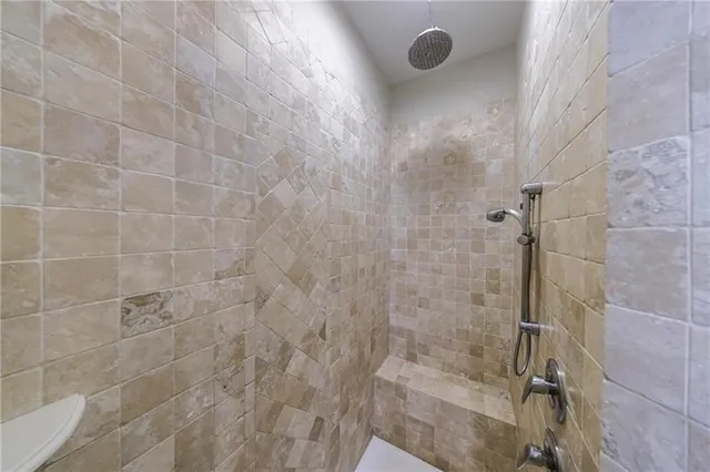 a view of a house with backyard sitting area and porch