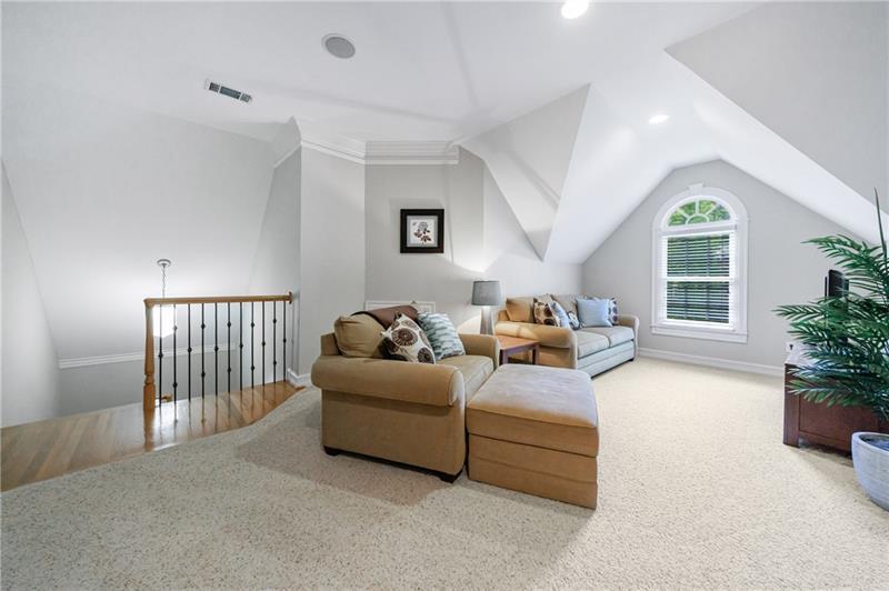 1255 Beech Haven Road Northeast Atlanta, GA 30324 - Photo 49 of 87 a living room with furniture a potted plant and a window