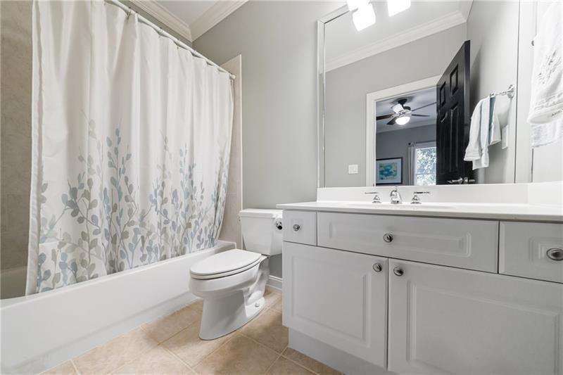 1255 Beech Haven Road Northeast Atlanta, GA 30324 - Photo 51 of 87 a bathroom with a sink toilet and shower