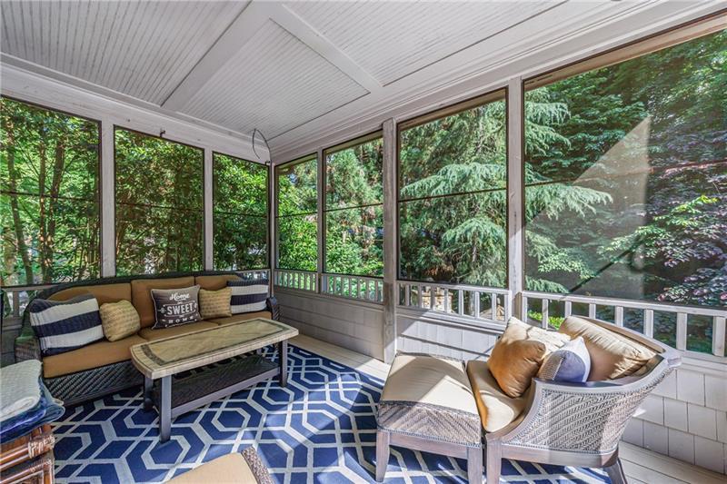 1255 Beech Haven Road Northeast Atlanta, GA 30324 - Photo 69 of 87 a living room with furniture and a floor to ceiling window
