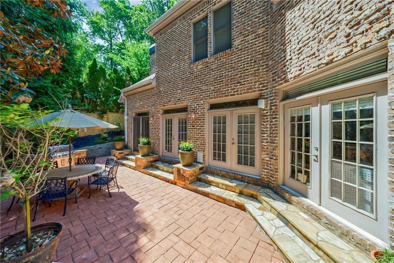 1255 Beech Haven Road Northeast Atlanta, GA 30324 - Photo 73 of 87 a view of a house with backyard sitting area and porch
