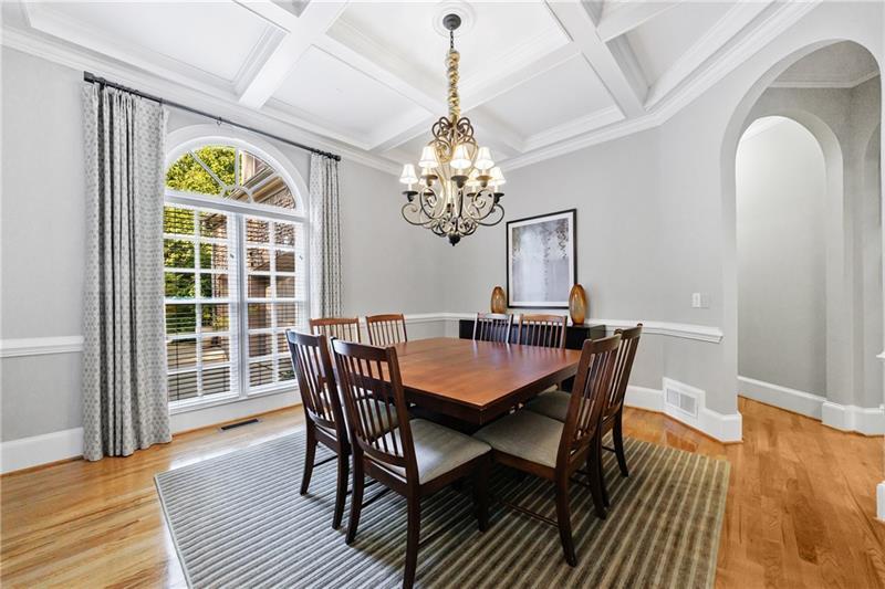1255 Beech Haven Road Northeast Atlanta, GA 30324 - Photo 8 of 87 a dining room with furniture a chandelier and wooden floor