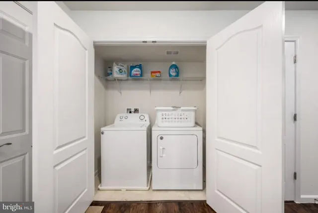 a utility room with dryer and washer