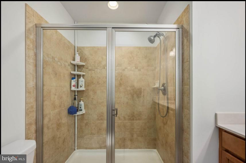 111 Tree Line Drive Fredericksburg, VA 22405 - Photo 19 of 20 a bathroom with a glass shower door
