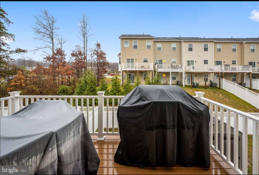 111 Tree Line Drive Fredericksburg, VA 22405 - Photo 20 of 20 a view of a balcony with two chairs and a table