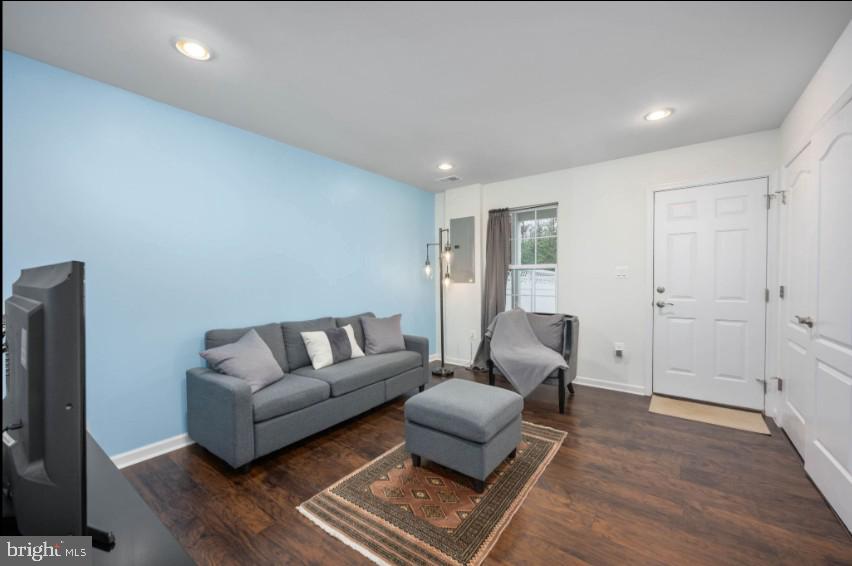 111 Tree Line Drive Fredericksburg, VA 22405 - Photo 10 of 20 a living room with furniture and a flat screen tv