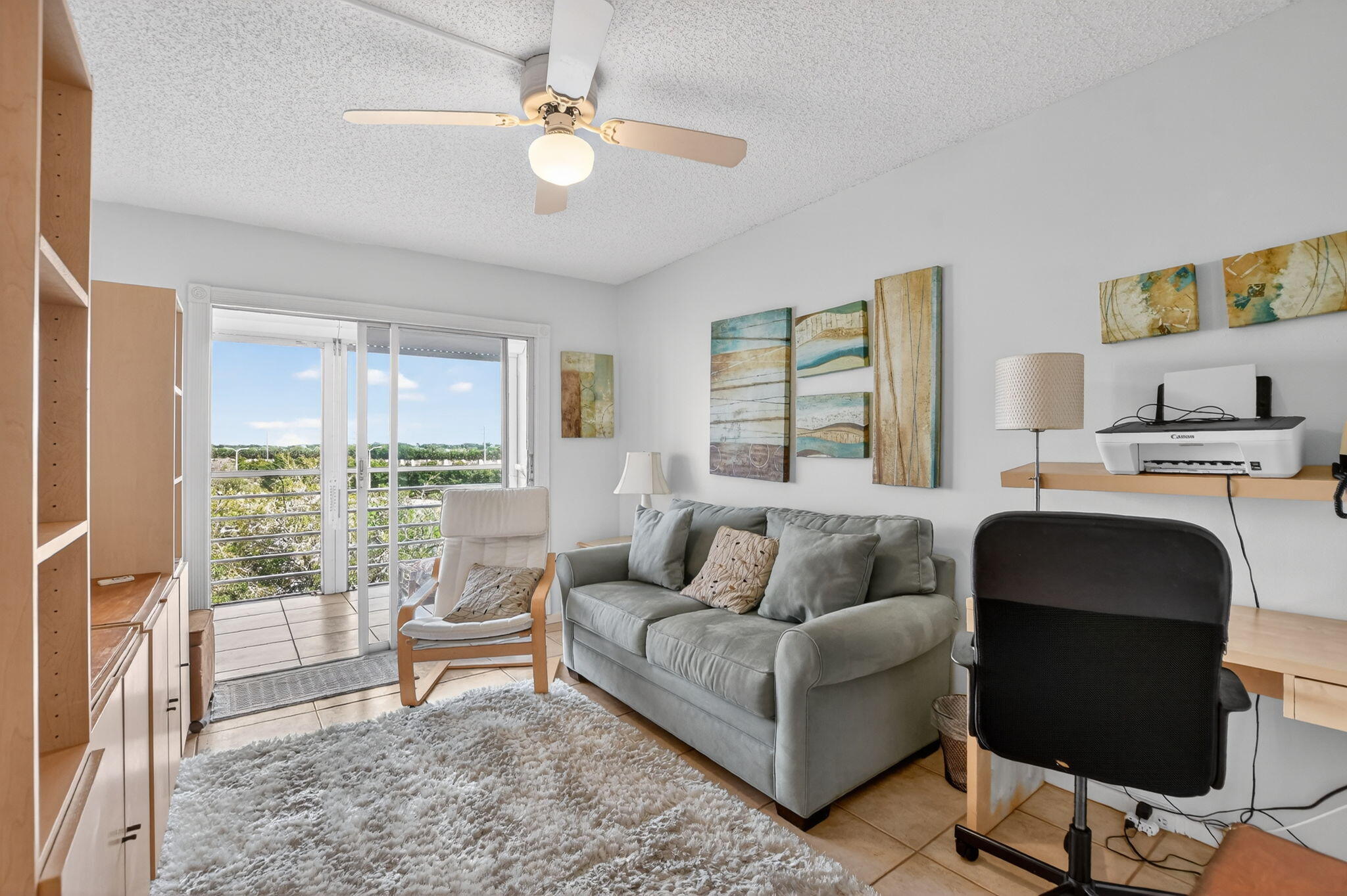 4008 Hythe A Boca Raton, FL 33434 - Photo 18 of 58 a living room with furniture and a large window