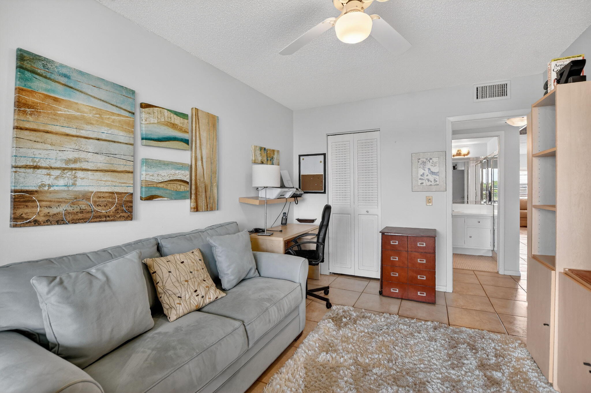 4008 Hythe A Boca Raton, FL 33434 - Photo 19 of 58 a living room with furniture and a large window