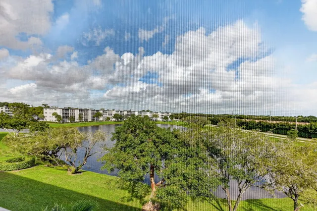 a view of a house with a swimming pool