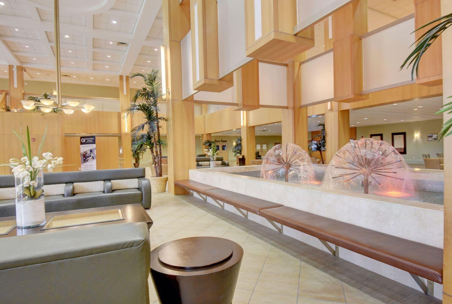 4008 Hythe A Boca Raton, FL 33434 - Photo 32 of 58 a lobby with furniture and a large window