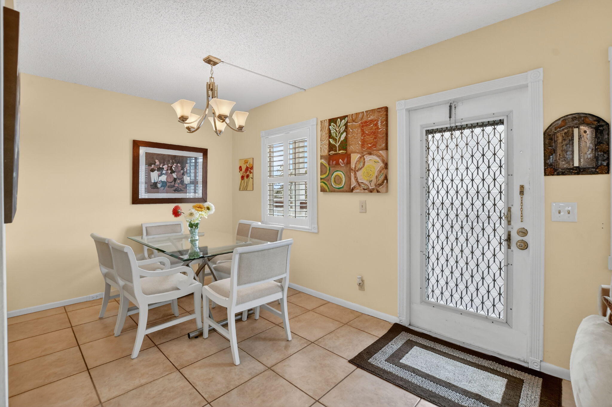 4008 Hythe A Boca Raton, FL 33434 - Photo 6 of 58 a view of a dining room with furniture