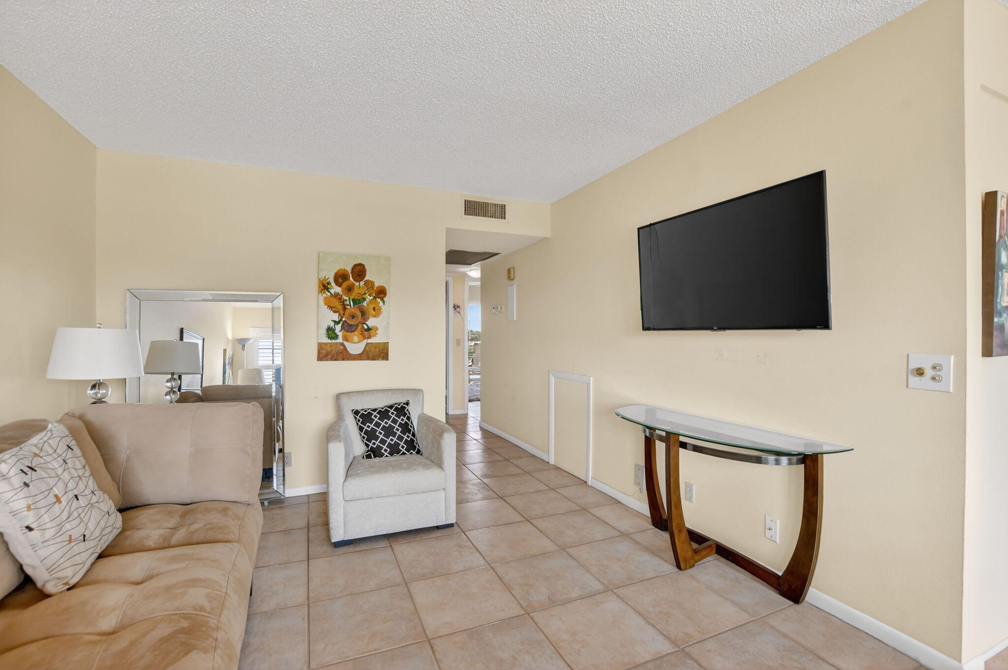 4008 Hythe A Boca Raton, FL 33434 - Photo 10 of 58 a living room with furniture and a flat screen tv