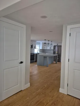 a view of a kitchen with a sink