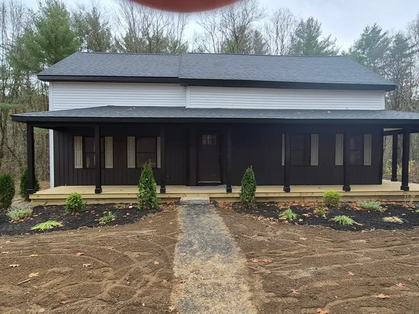 a house view with a garden space