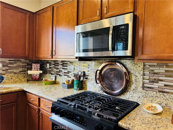 a living room with furniture gym equipment and a flat screen tv