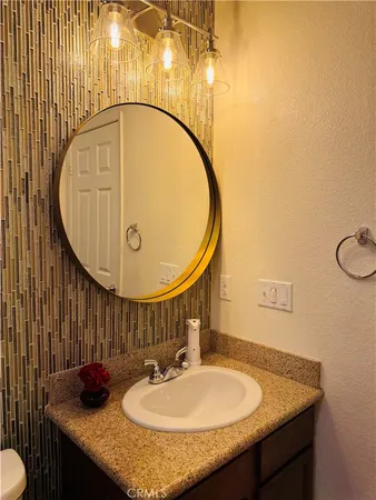 a living room with a couch and a flat screen tv