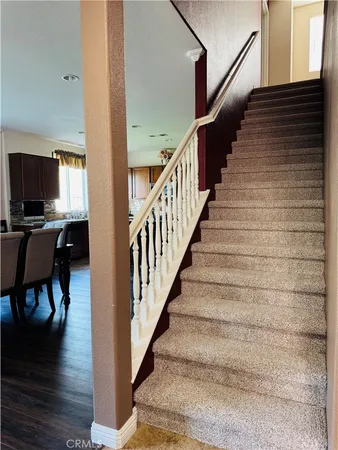 a view of a glass top table and floor to ceiling window