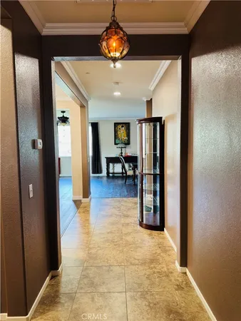 a living room with furniture window and wooden floor