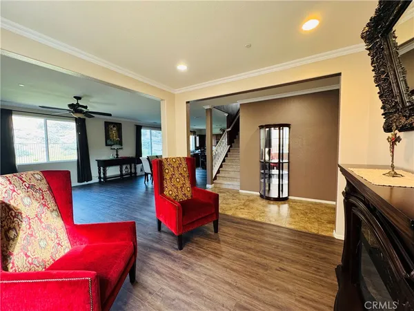 a view of a livingroom with wooden floor