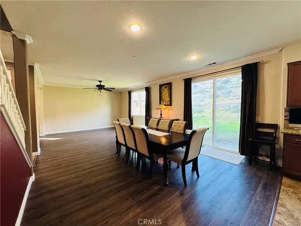 a view of a porch with furniture and a window