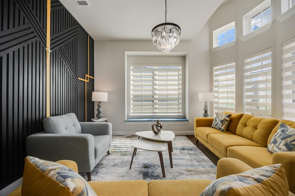 1524 Buckthorn Road Fate, TX 75087 - Photo 14 of 37 a living room with furniture and a large window