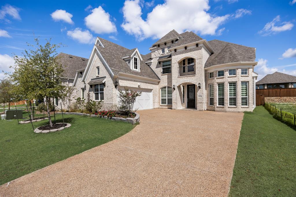 1524 Buckthorn Road Fate, TX 75087 - Photo 2 of 37 a front view of a house with a yard