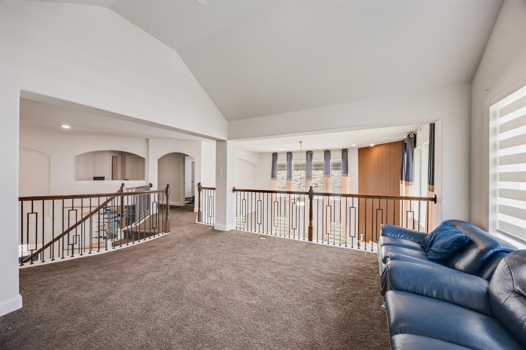 1524 Buckthorn Road Fate, TX 75087 - Photo 23 of 37 a living room with furniture and a large window