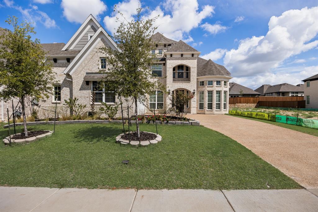 1524 Buckthorn Road Fate, TX 75087 - Photo 6 of 37 a front view of a house with a yard