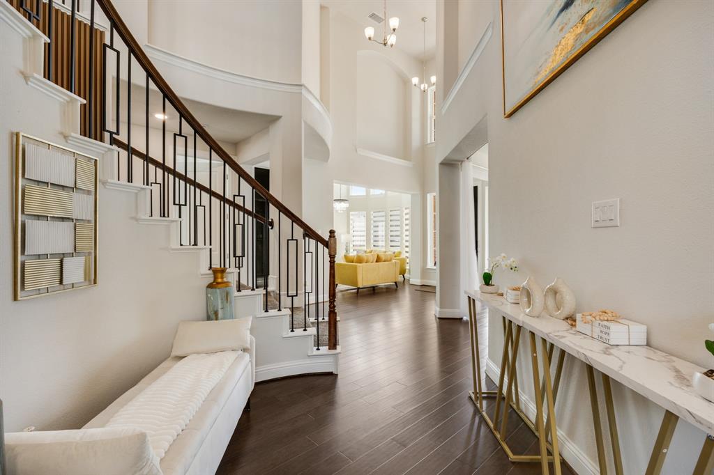 1524 Buckthorn Road Fate, TX 75087 - Photo 7 of 37 a view of an entryway and wooden floor