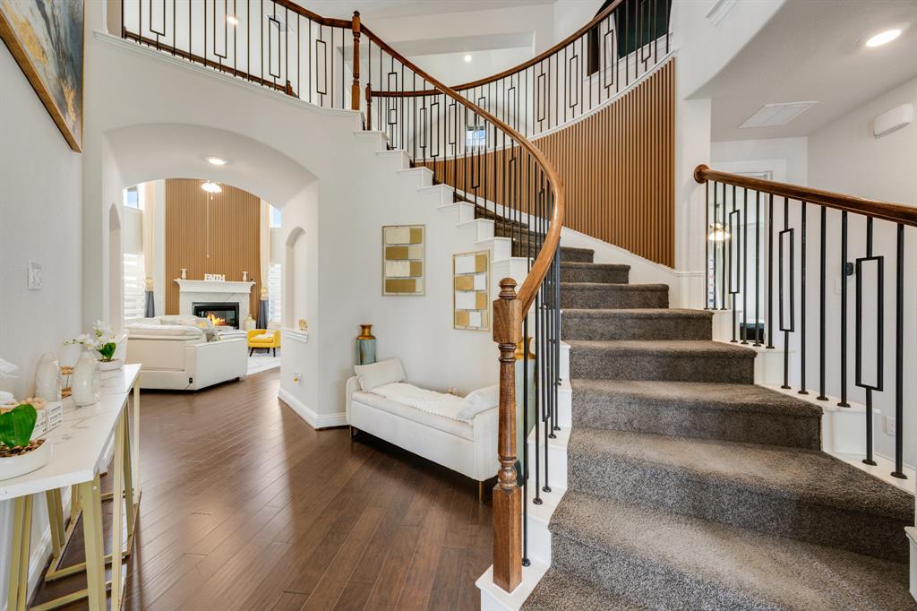 1524 Buckthorn Road Fate, TX 75087 - Photo 8 of 37 a view of entryway and hall with wooden floor