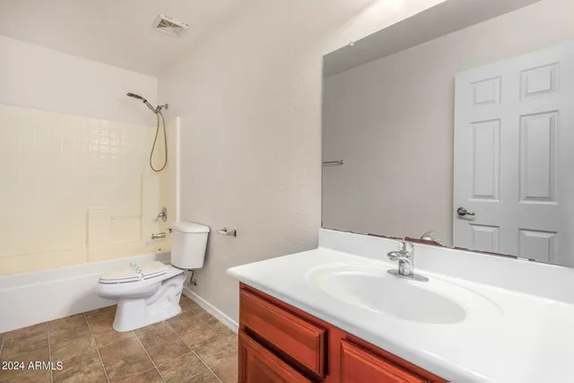 a view of room with hardwood floor