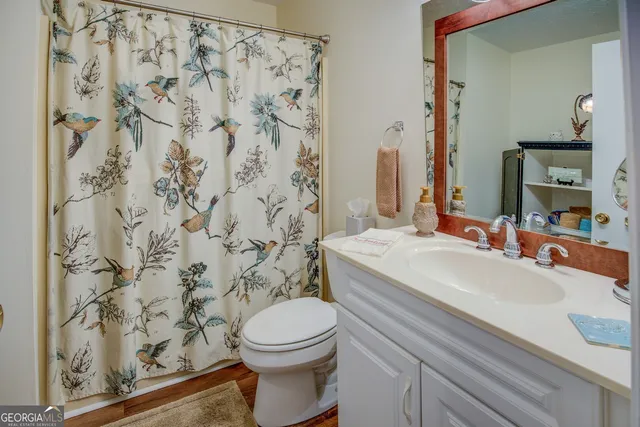 a bathroom with a bathtub and a window