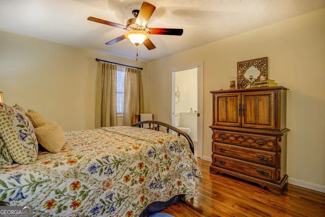 a bathroom with a shower and a window
