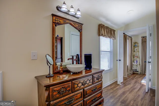 a living room with furniture and a window