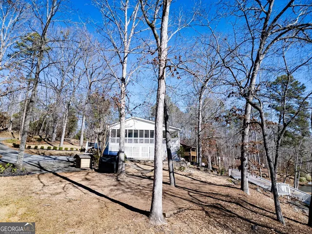 a view of a large building next to a yard