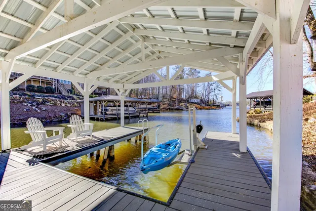 a view of house with a yard in front of it