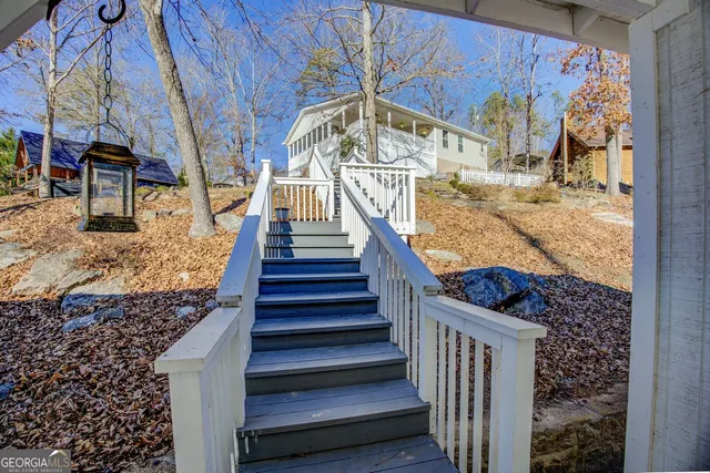 an aerial view of multiple house with outdoor space
