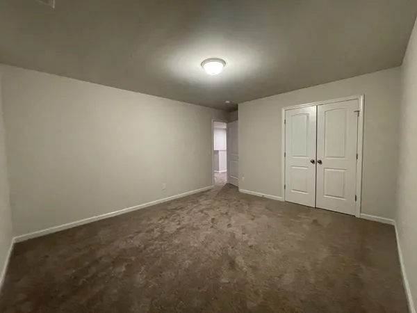 an empty room with an entryway
