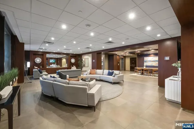 a living room with furniture and a table