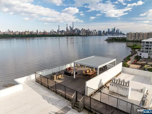 a view of a city and lake