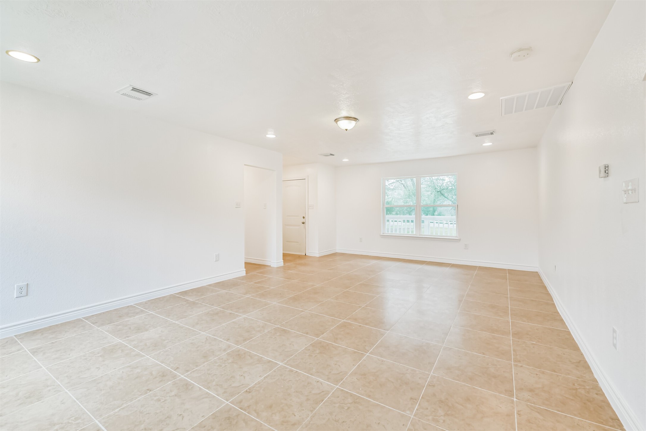10412 Ehlers Road Conroe, TX 77302 - Photo 16 of 37 an empty room with a empty space and window