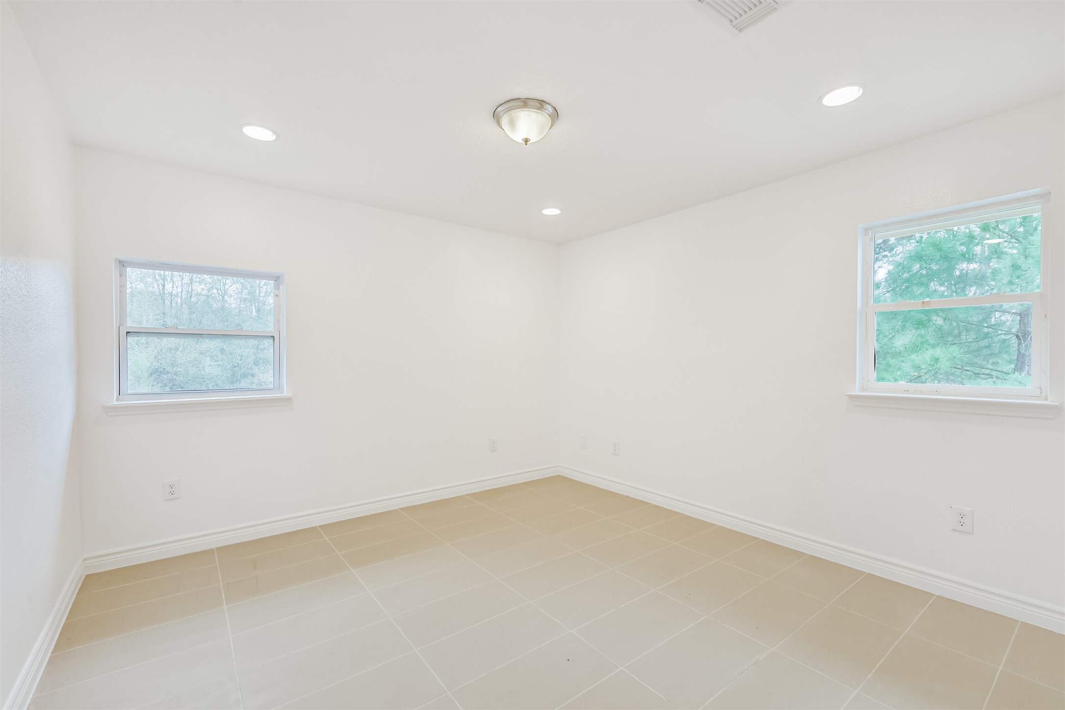 10412 Ehlers Road Conroe, TX 77302 - Photo 25 of 37 an empty room with a window