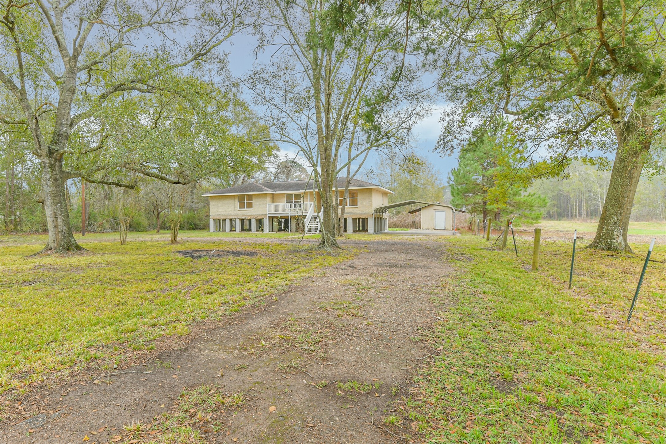 10412 Ehlers Road Conroe, TX 77302 - Photo 6 of 37 a view of swimming pool with outdoor seating and trees