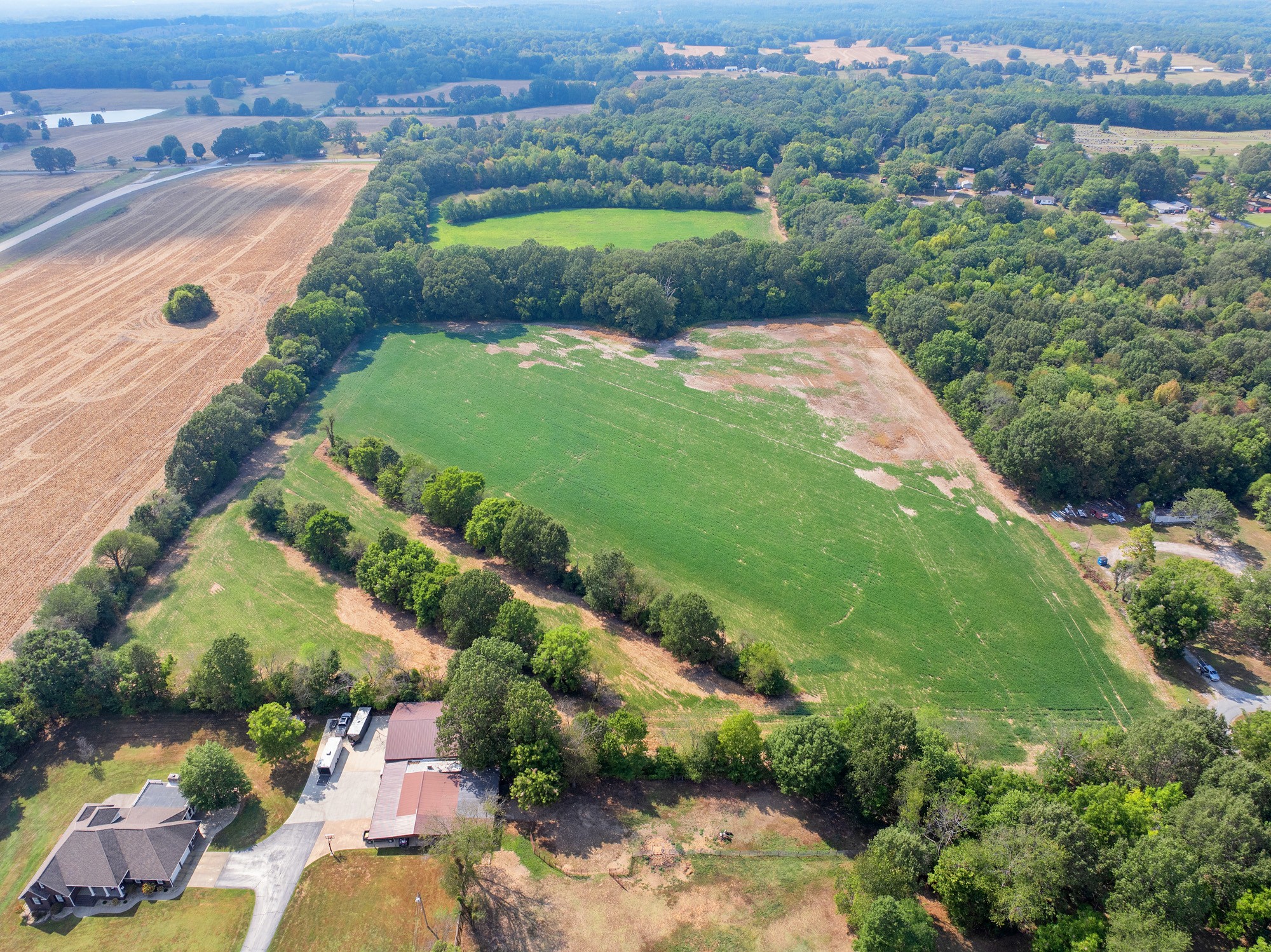 203 Peace And Harmony Road Gleason, TN 38229 - Photo 9 of 24 an aerial view of a house with a yard