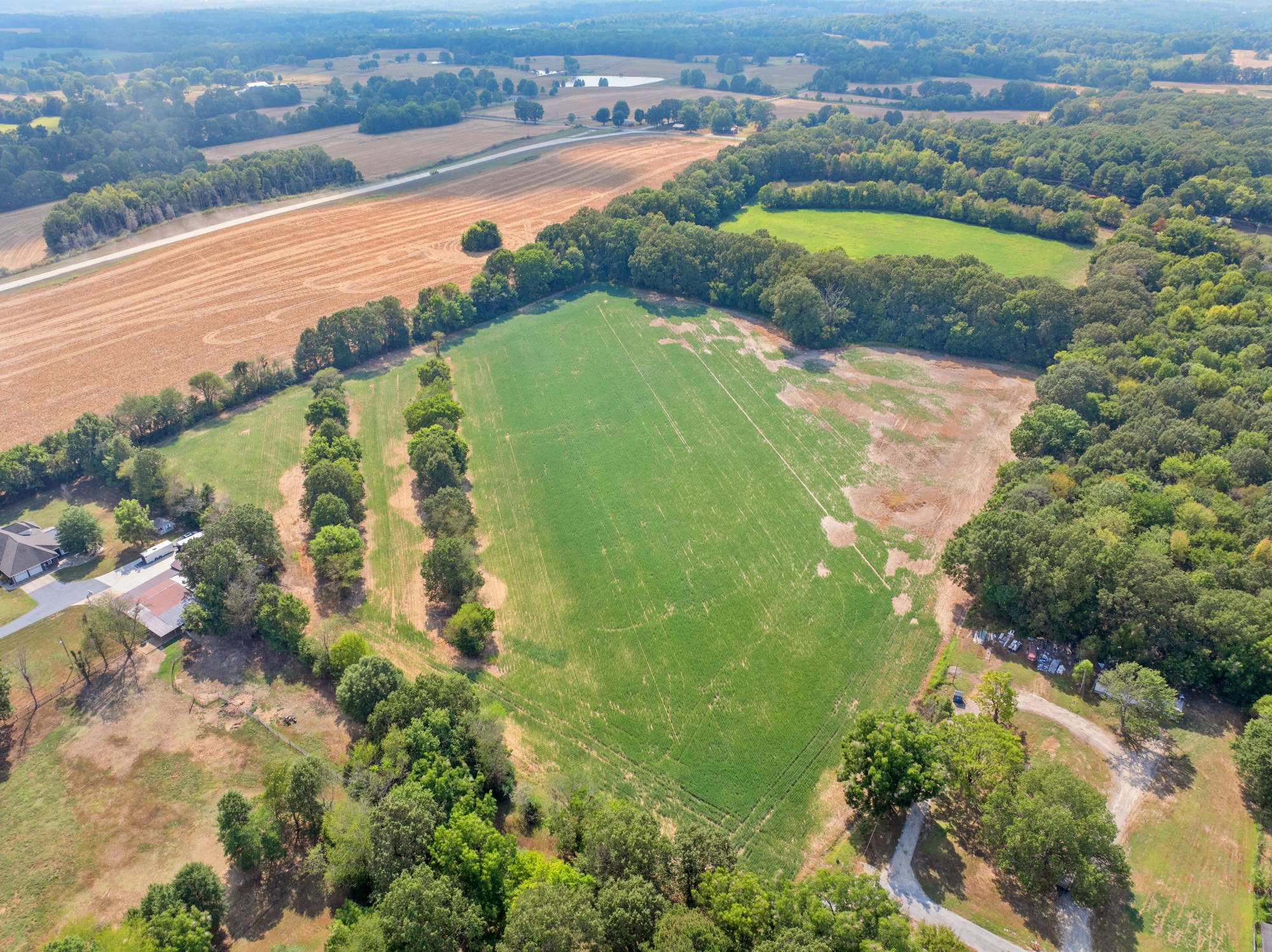 203 Peace And Harmony Road Gleason, TN 38229 - Photo 10 of 24 an aerial view of water body with boats and residential houses with outdoor space