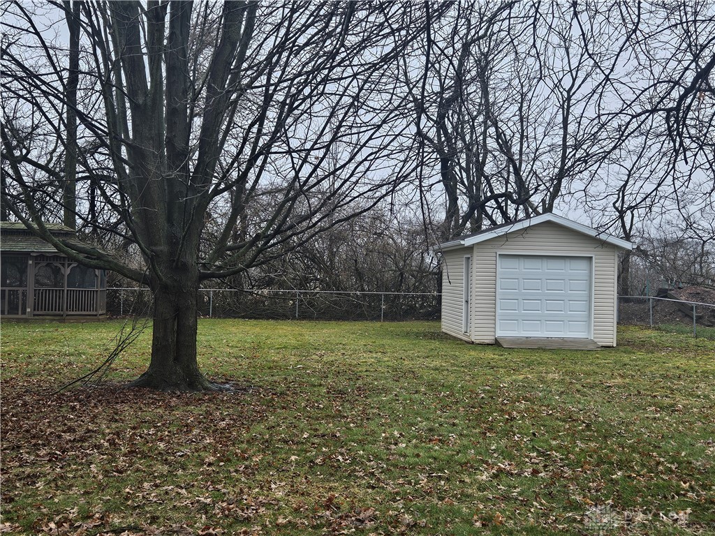 4909 Shannon Avenue Springfield, OH 45504 - Photo 19 of 21 This spacious yard offers ample outdoor living potential, complete with a practical storage shed.
