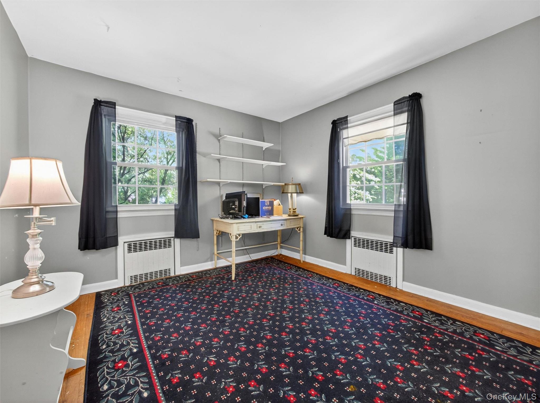 56 Oak Road New City, NY 10956 - Photo 17 of 30 a living room with a couch and a table